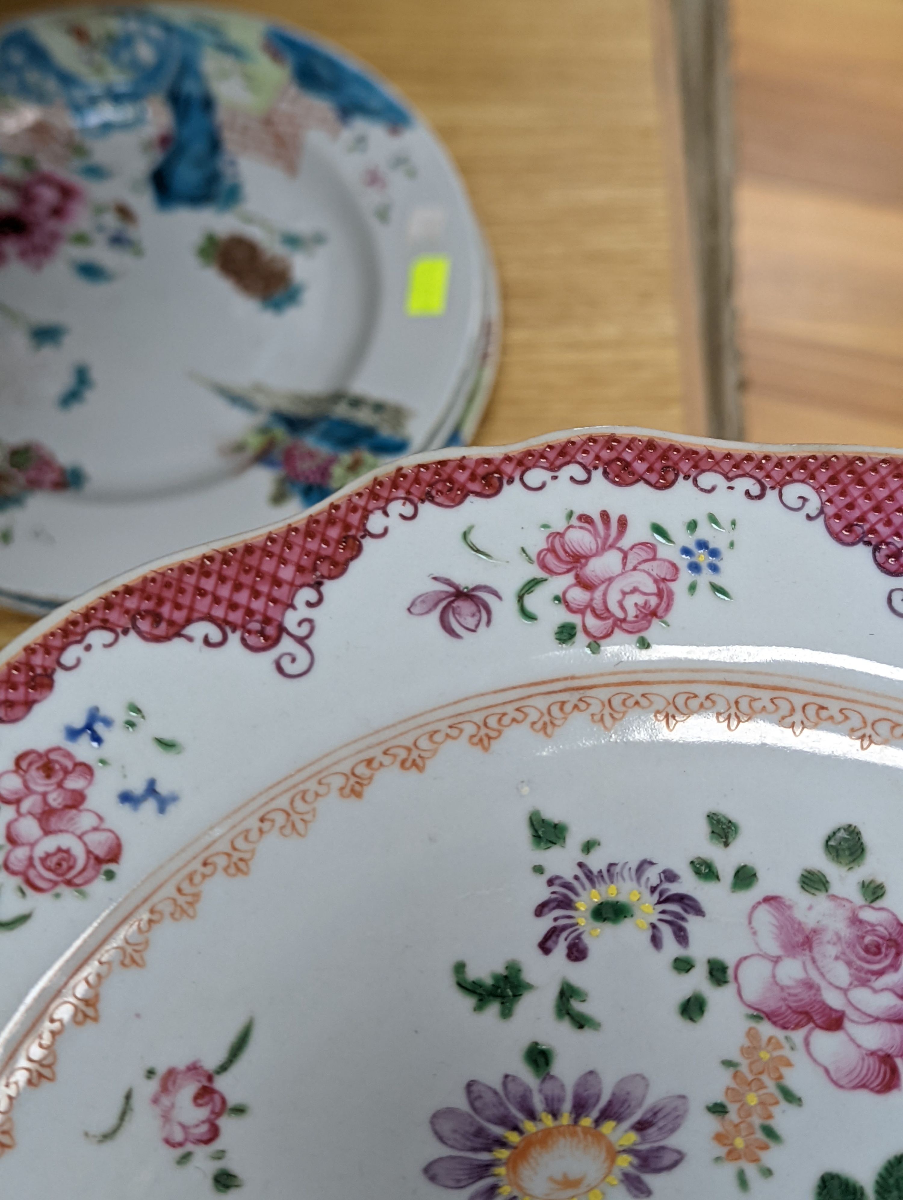 Two pairs of 18th century Chinese famille rose plates and an Imari plate, 26cm